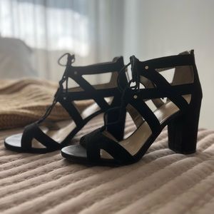 Black criss cross heels! Worn once, great condition.